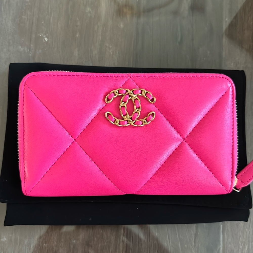 Brand new never used Chanel 19 zip around wallet in Fuchsia.